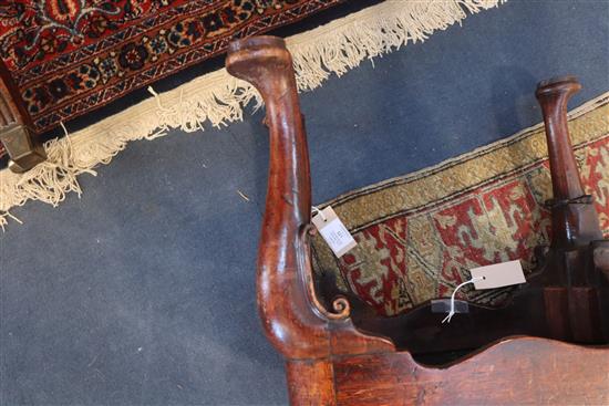 An early 18th century red walnut stool, W.1ft 6in. D.1ft 2in. H.1ft 4in.